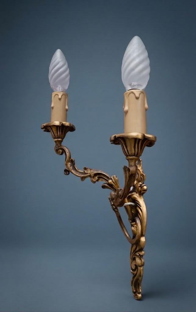 Pair of Vintage 1970s Bronze Louis XV Style Wall Sconces, Asymmetric Two-Arm Rocaille Design with Fluted Cups, Mirrored Candle Lights