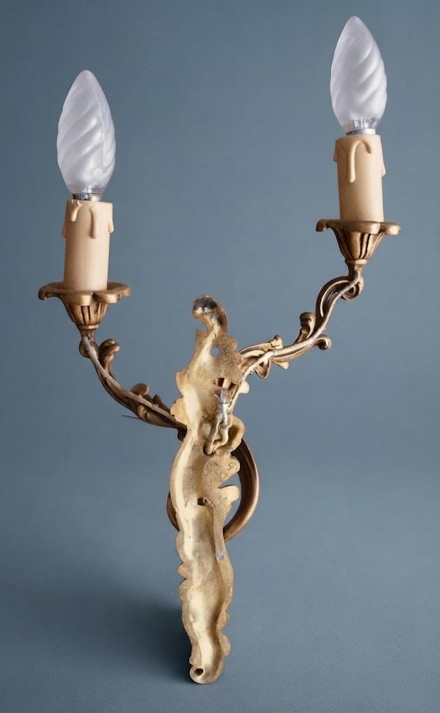 Pair of Vintage 1970s Bronze Louis XV Style Wall Sconces, Asymmetric Two-Arm Rocaille Design with Fluted Cups, Mirrored Candle Lights