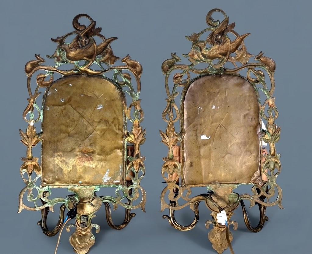 Pair of Antique Bronze Mirrored Wall Sconces, Three-Light Girandoles with Rabbits, Winged Bird Crest and Beveled Glass, 1890s