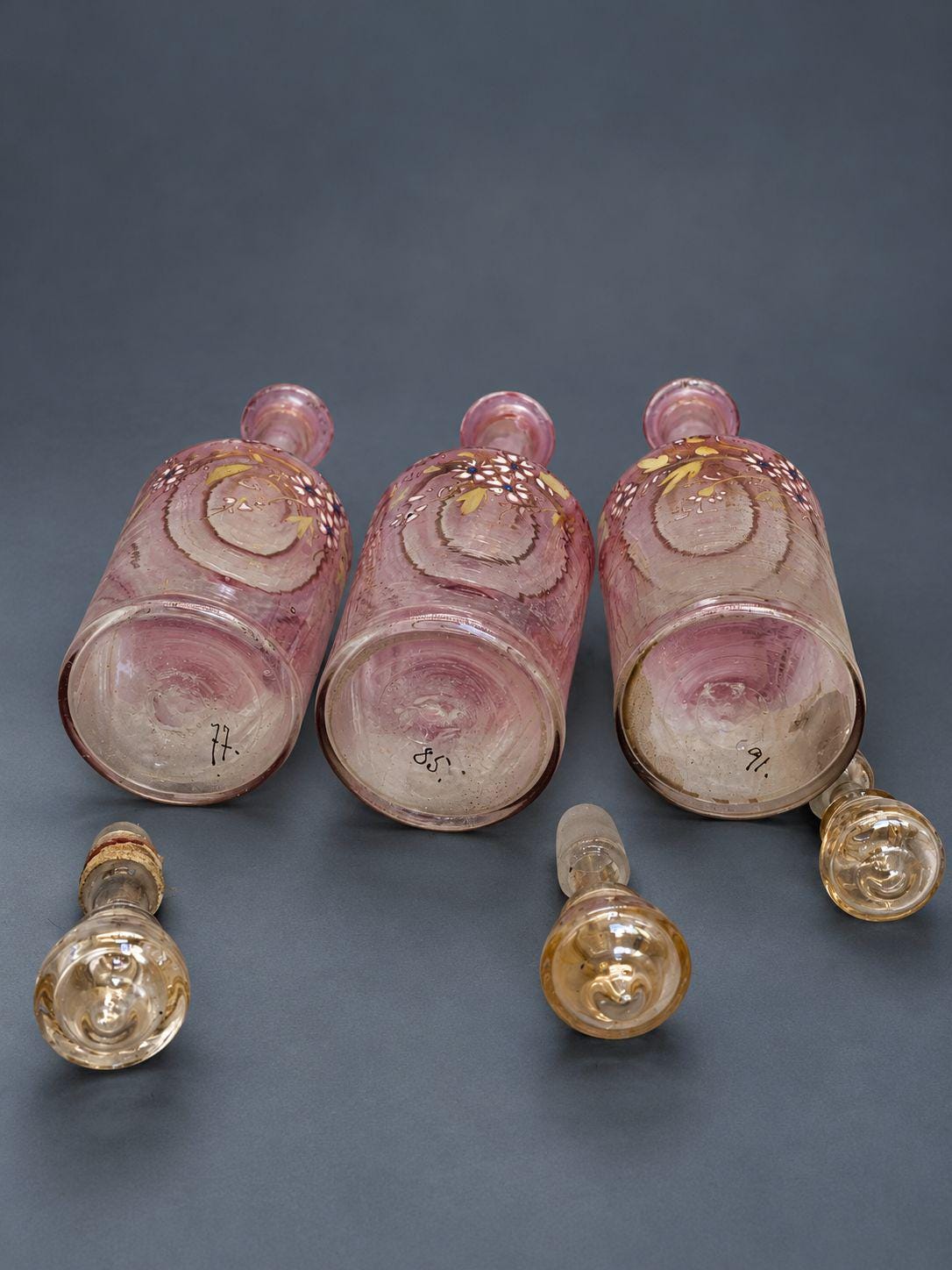 Antique Napoleon III Liqueur Set, Two Cranberry Enameled Glass Decanters and Cordial Glasses on Gilt Brass Mirrored Tray Stand