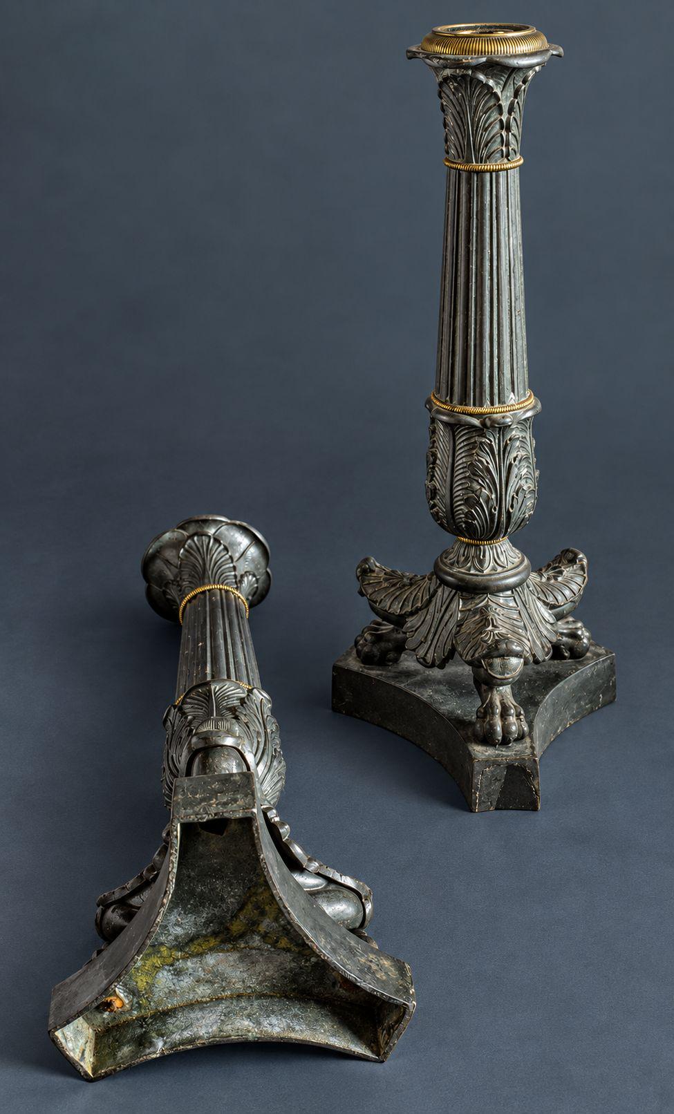 Pair of Antique Restauration Period Patinated Bronze Candlesticks, Fluted Columns with Palmettes and Lion Paw Feet, 1815-1830