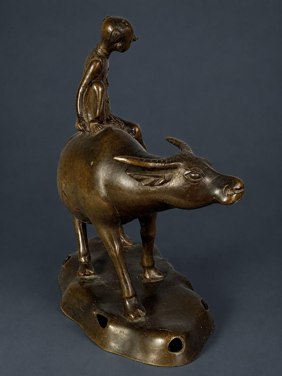 Antique Patinated Bronze Boy Riding a Water Buffalo, Herd Boy Sculpture on Pierced Rockwork Base, Asian Decor, circa 1900