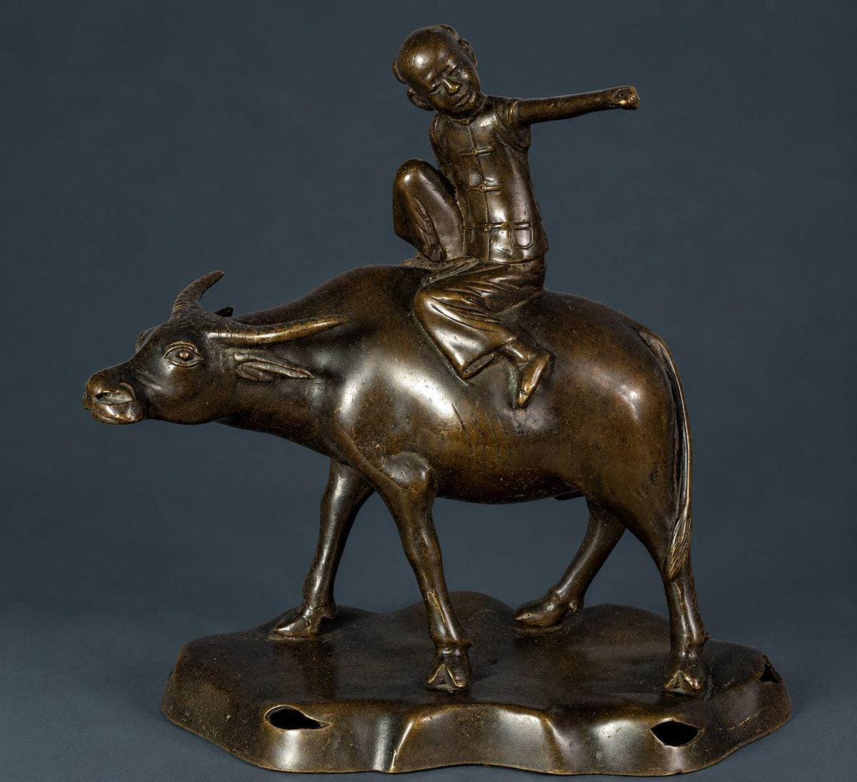 Antique Patinated Bronze Boy Riding a Water Buffalo, Herd Boy Sculpture on Pierced Rockwork Base, Asian Decor, circa 1900