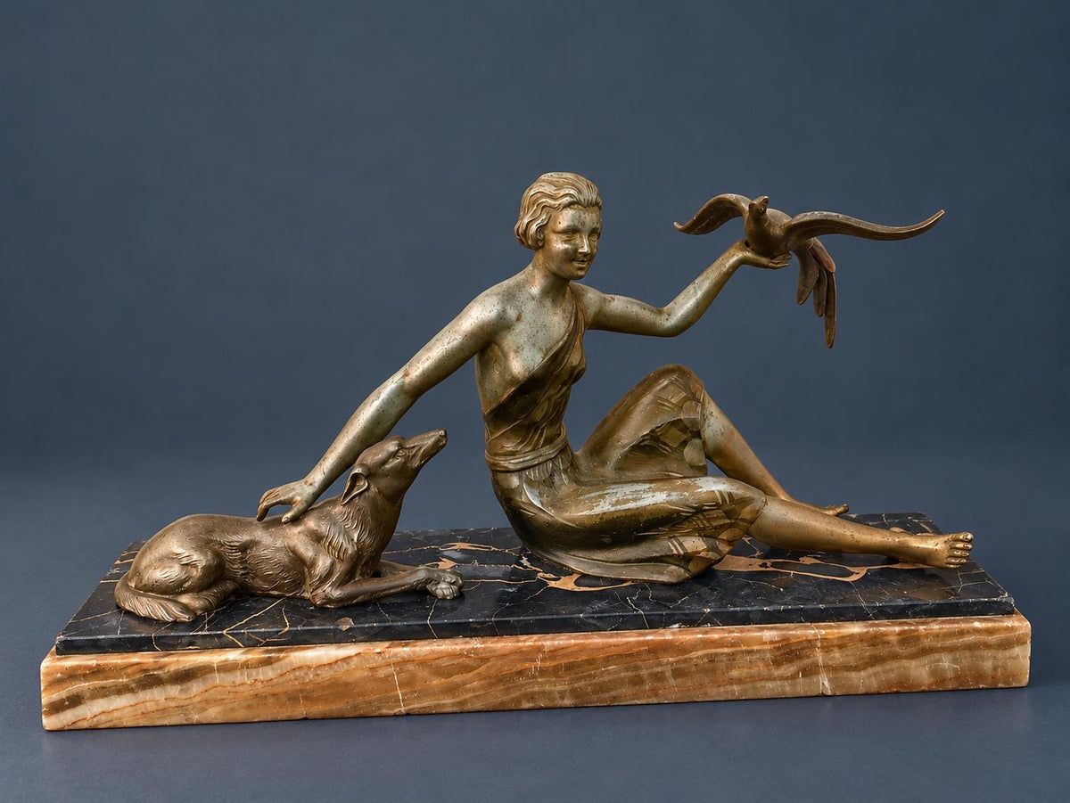 Vintage Art Deco Spelter Sculpture, Seated Woman with Greyhound Releasing an Exotic Bird, Portoro Marble Base, 1930s