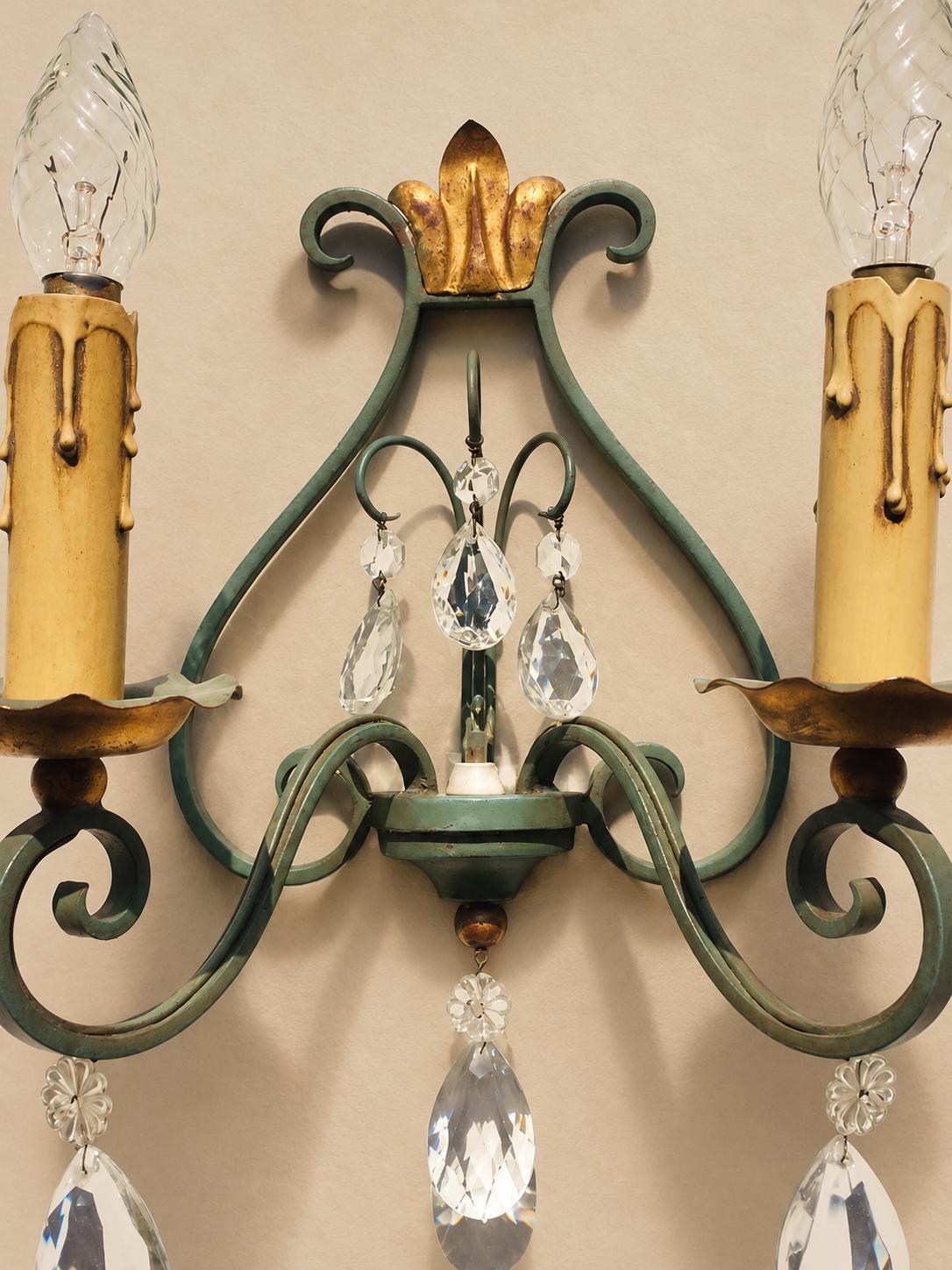 Pair of Vintage 1950s Verdigris Wrought Iron Wall Sconces, Gilt Fleur-de-Lis Crest, Glass Drops, Hollywood Regency Lights