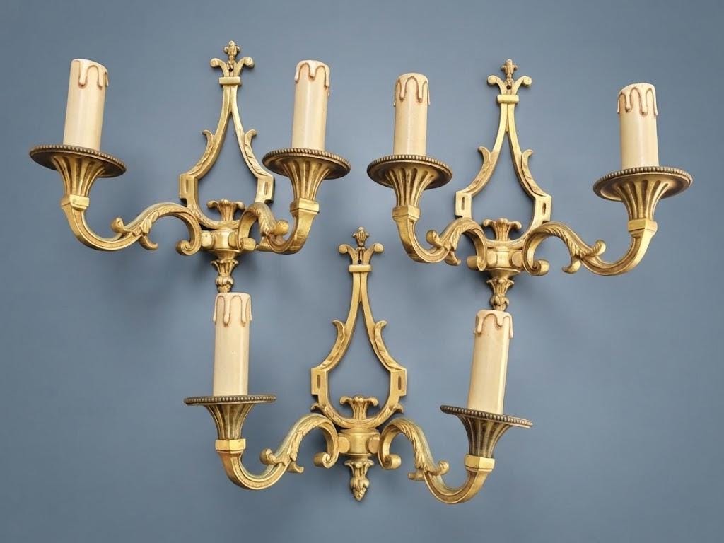 Set of Three Vintage Louis XVI Style Bronze Wall Sconces, Two-Arm Lyre Backplate with Fleur-de-Lis Crest and Beaded Bobeches
