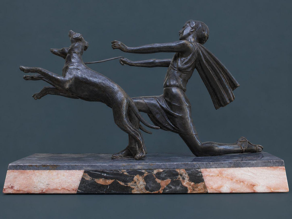 Vintage Art Deco Spelter Sculpture of a Kneeling Woman with Two Leaping Greyhounds on Marble Base, 1920s French Statue