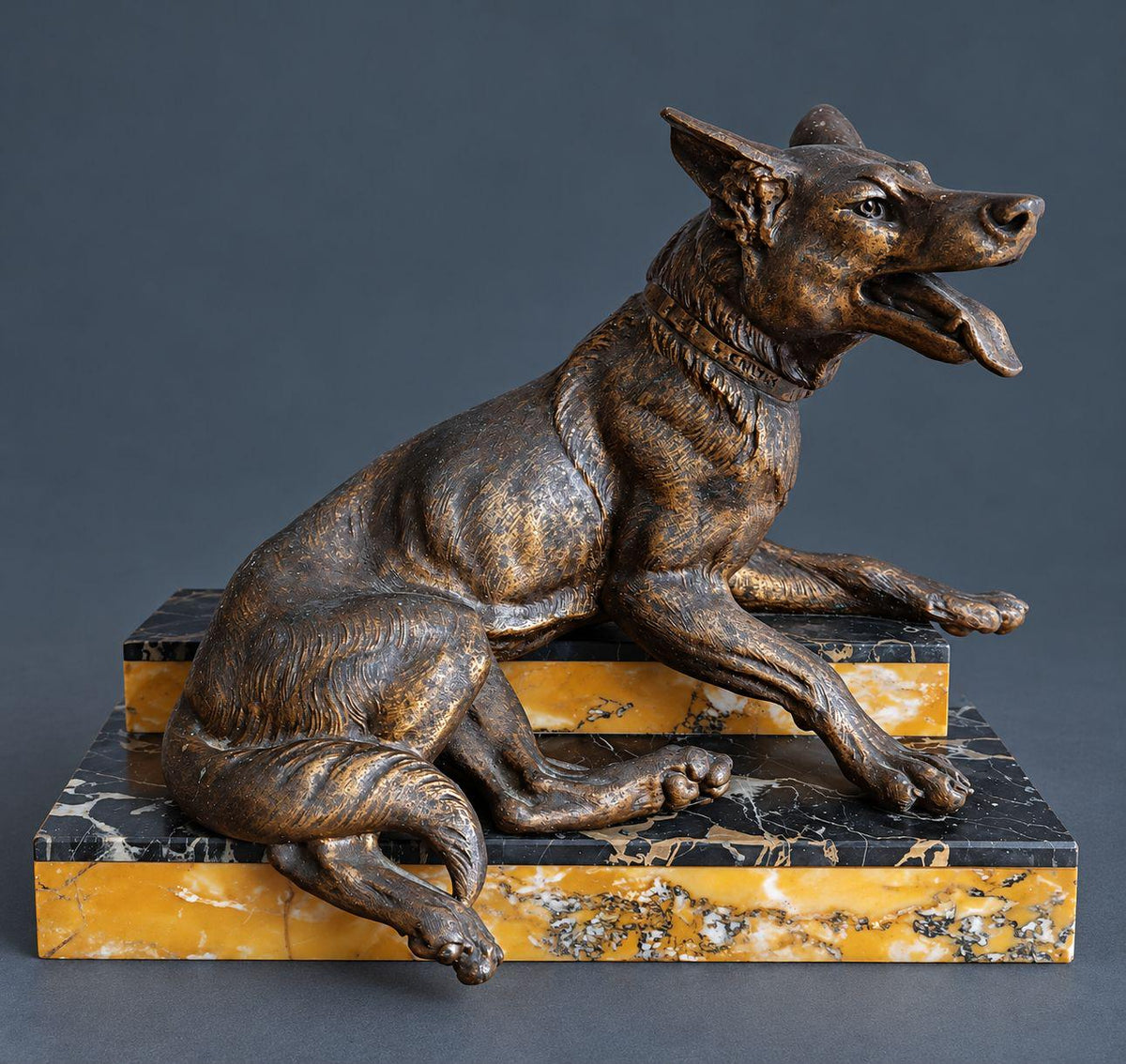 Vintage Art Deco L. Carvin Spelter German Shepherd Dog Sculpture, Signed on Collar, Reclining on Sienna and Portoro Marble Base