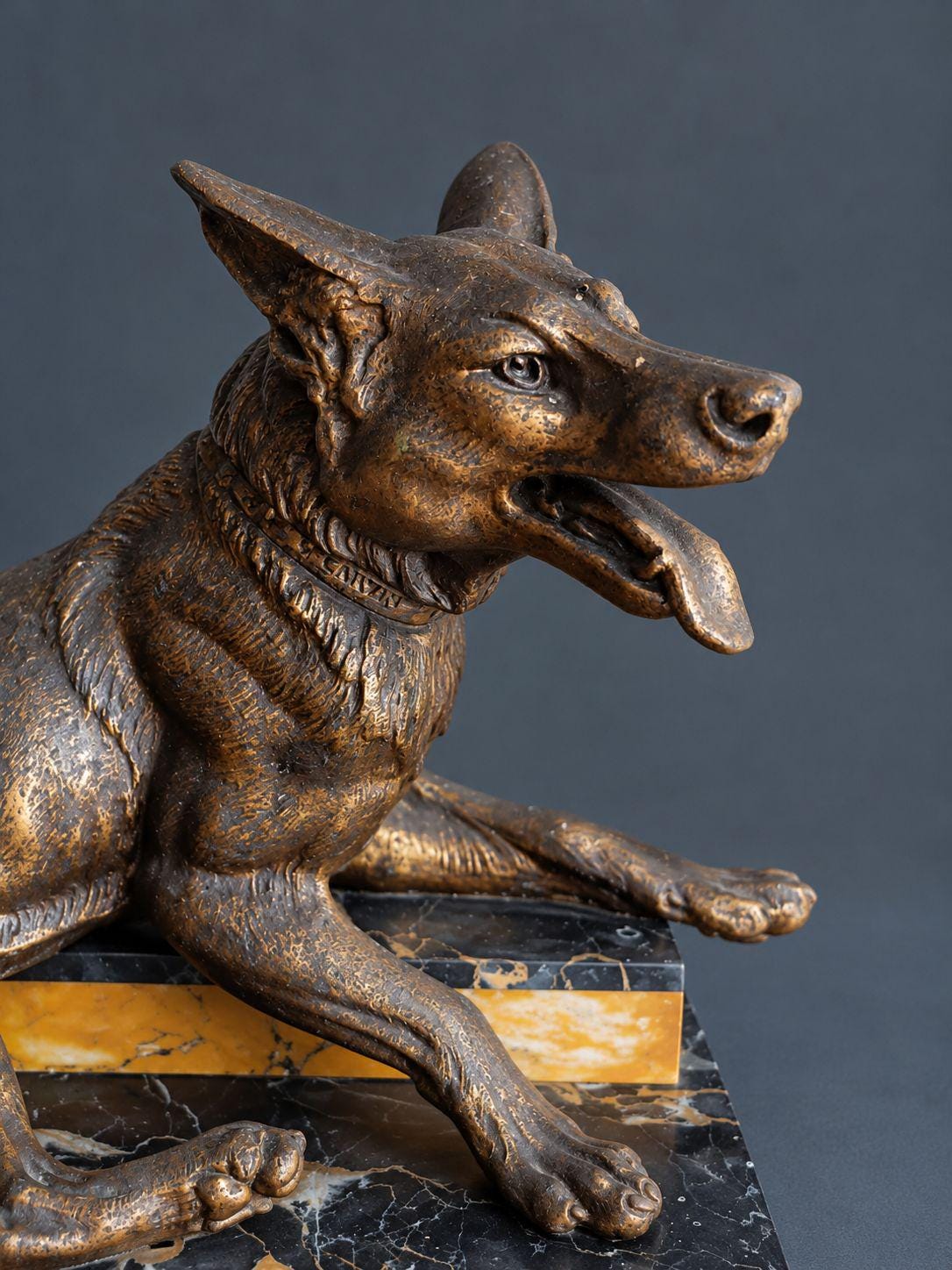 Vintage Art Deco L. Carvin Spelter German Shepherd Dog Sculpture, Signed on Collar, Reclining on Sienna and Portoro Marble Base