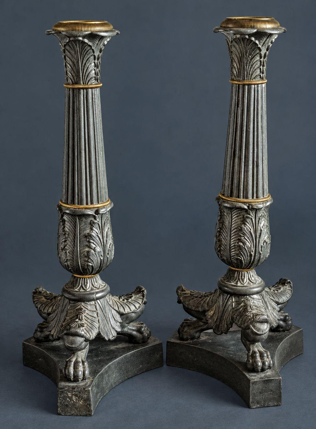 Pair of Antique Restauration Period Patinated Bronze Candlesticks, Fluted Columns with Palmettes and Lion Paw Feet, 1815-1830