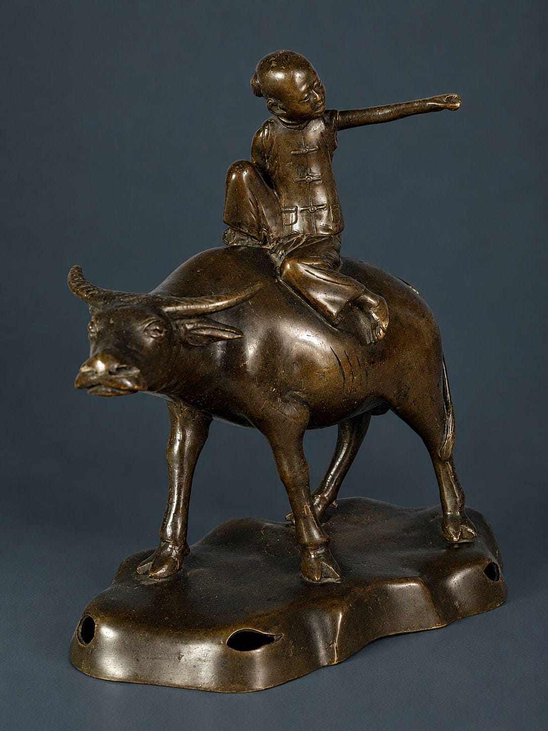 Antique Patinated Bronze Boy Riding a Water Buffalo, Herd Boy Sculpture on Pierced Rockwork Base, Asian Decor, circa 1900