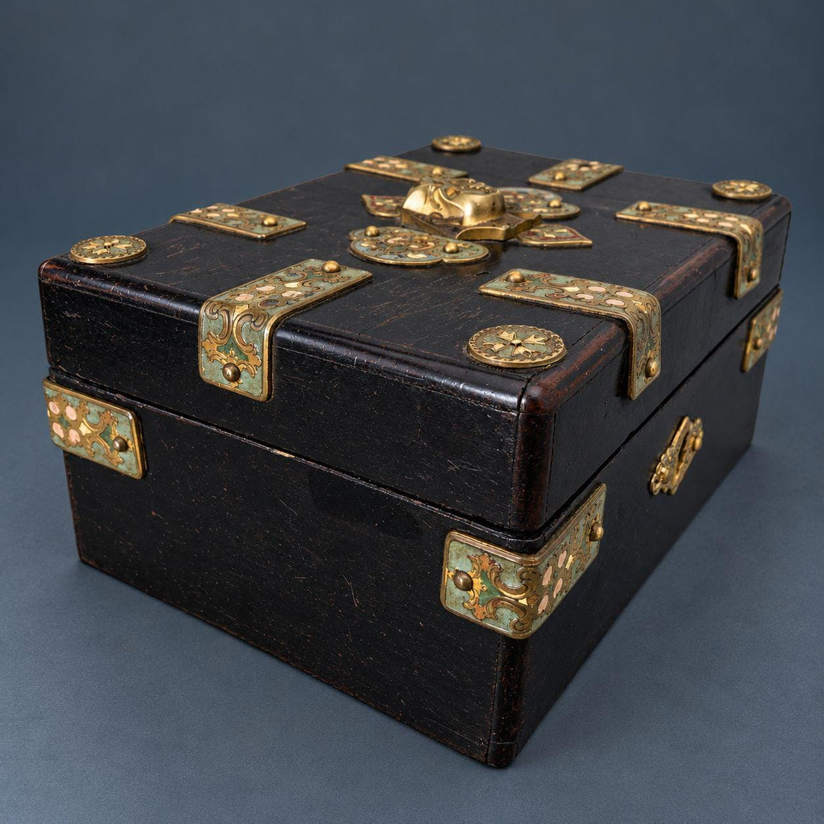 Antique Napoleon III Egyptian Revival Ebonized Box with Enameled Brass Pharaoh Head and Strapwork Mounts, Purple Silk Lining