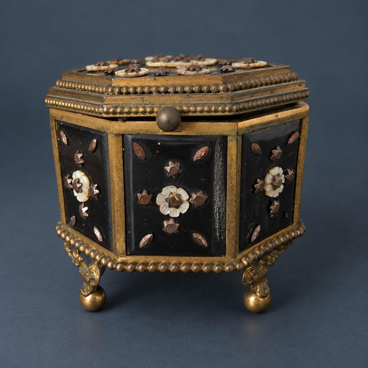 Antique Napoleon III Octagonal Jewelry Box with Mother of Pearl Flowers and Cut Steel Studs, Gilt Brass Frame on Ball Feet