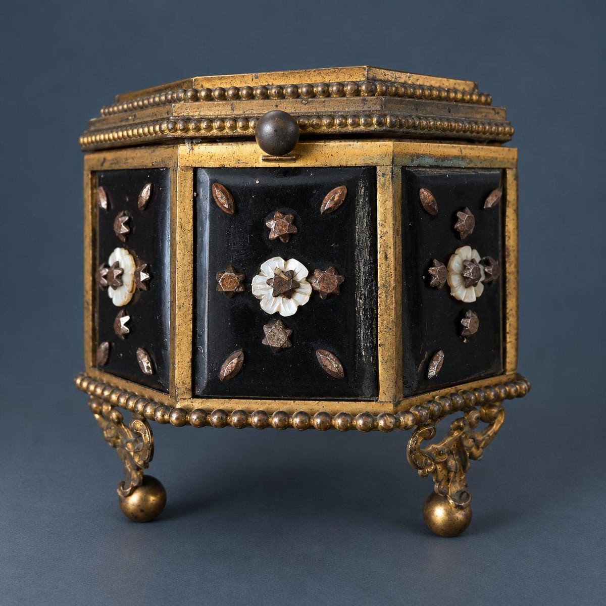 Antique Napoleon III Octagonal Jewelry Box with Mother of Pearl Flowers and Cut Steel Studs, Gilt Brass Frame on Ball Feet