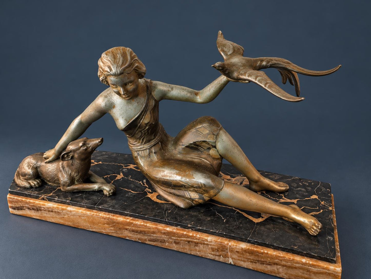 Vintage Art Deco Spelter Sculpture, Seated Woman with Greyhound Releasing an Exotic Bird, Portoro Marble Base, 1930s