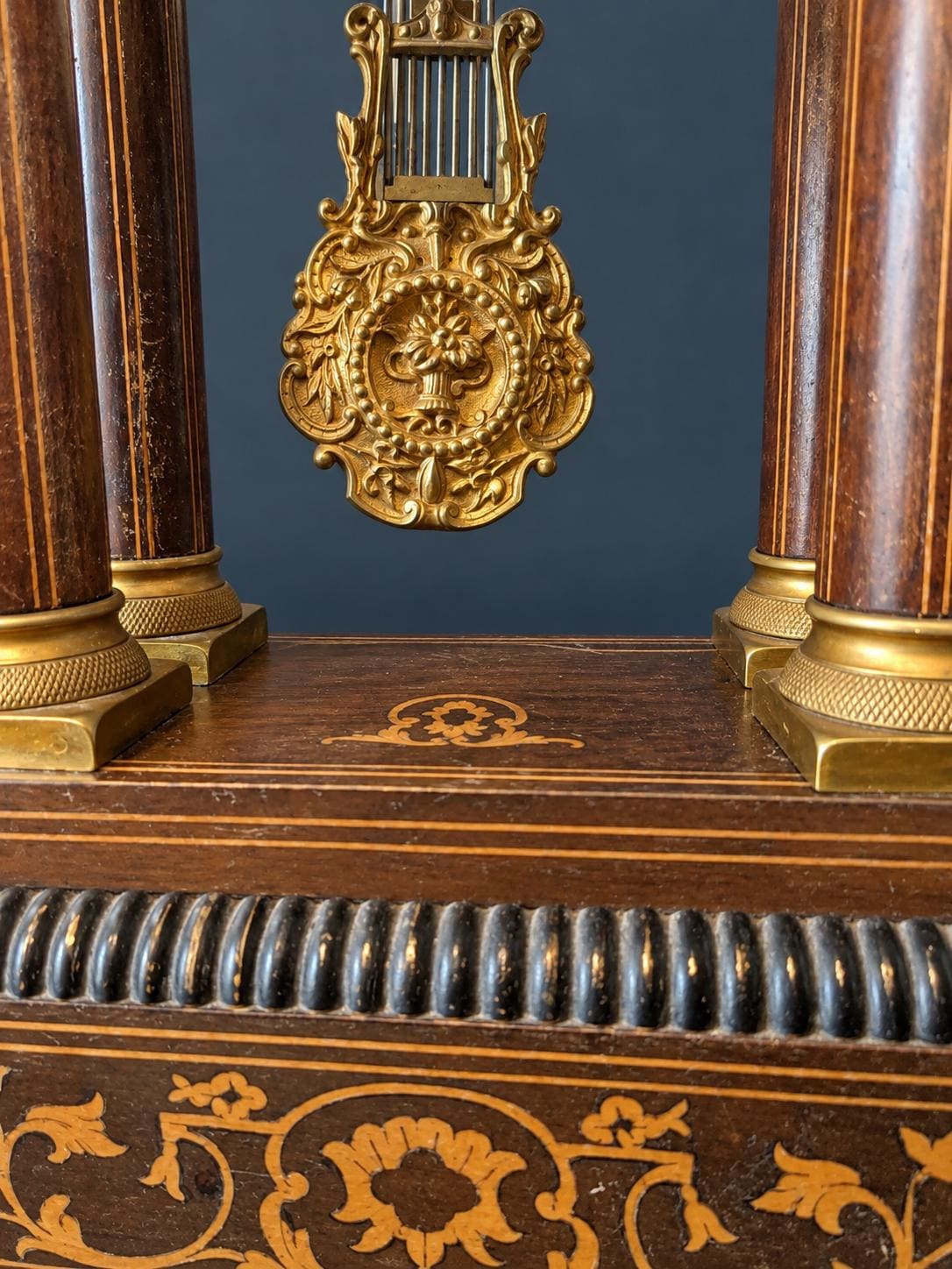Antique Charles X Portico Mantel Clock with Inlaid Wood Marquetry, Four Columns, Gilt Bronze Dial Surround, circa 1830