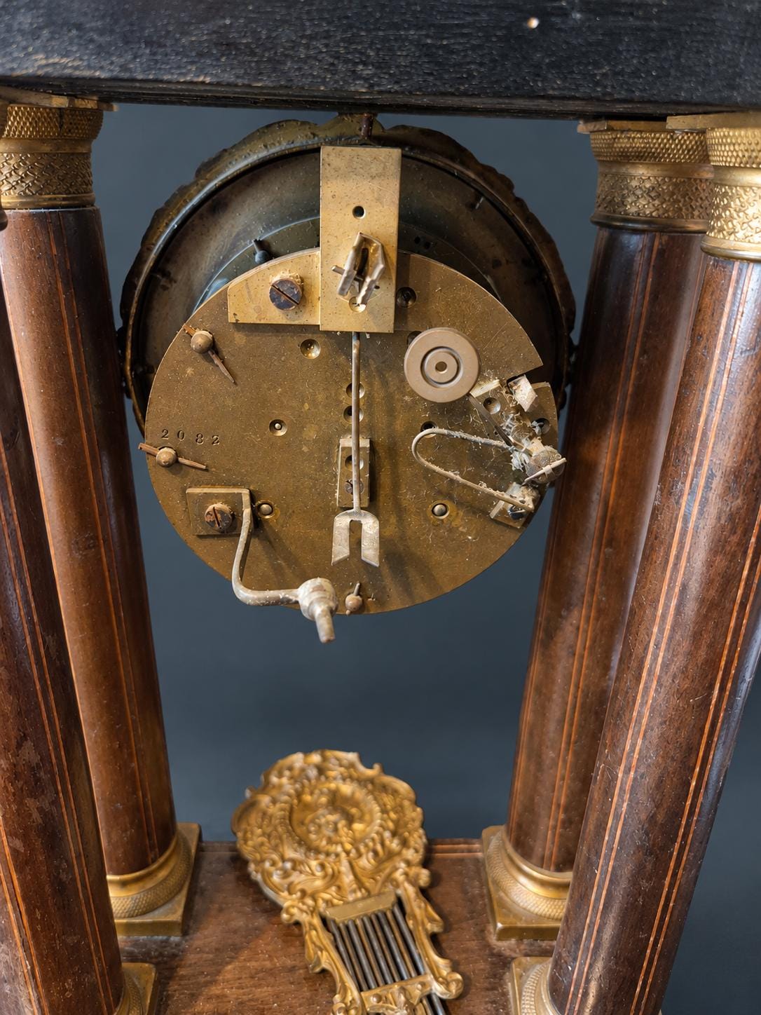 Antique Charles X Portico Mantel Clock with Inlaid Wood Marquetry, Four Columns, Gilt Bronze Dial Surround, circa 1830