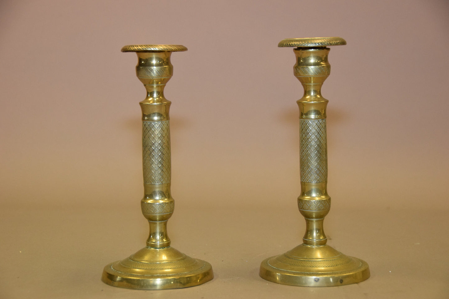 pair of antique bronze candlesticks